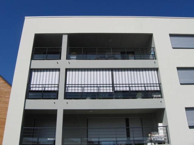 installateur store balcon électrique ou manuel sur Lyon - CLINIQUE DU STORE 